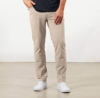 model showing front of the Around The Clock Pants in Khaki