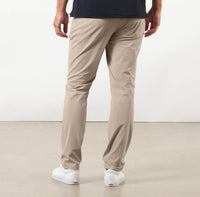 model showing back of the Around The Clock Pants in Khaki
